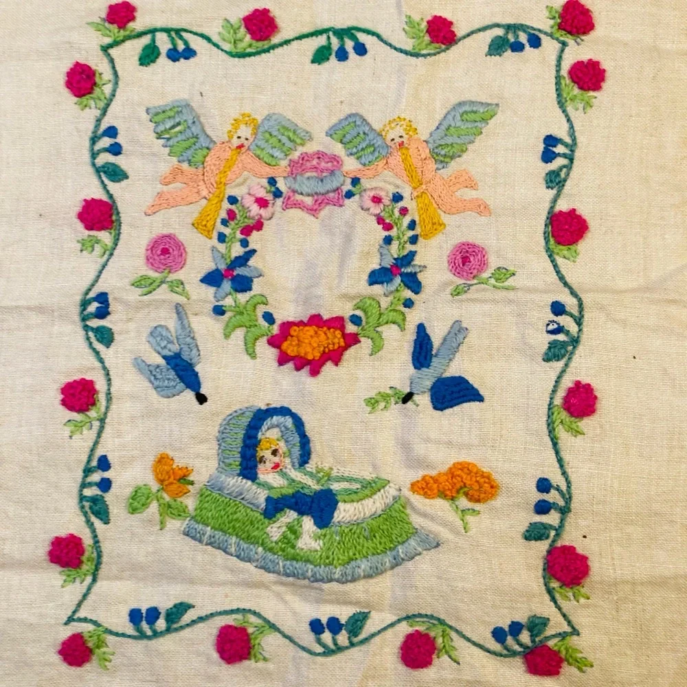 Beautiful small sampler of newborn child, knitted in colorful needlework linen